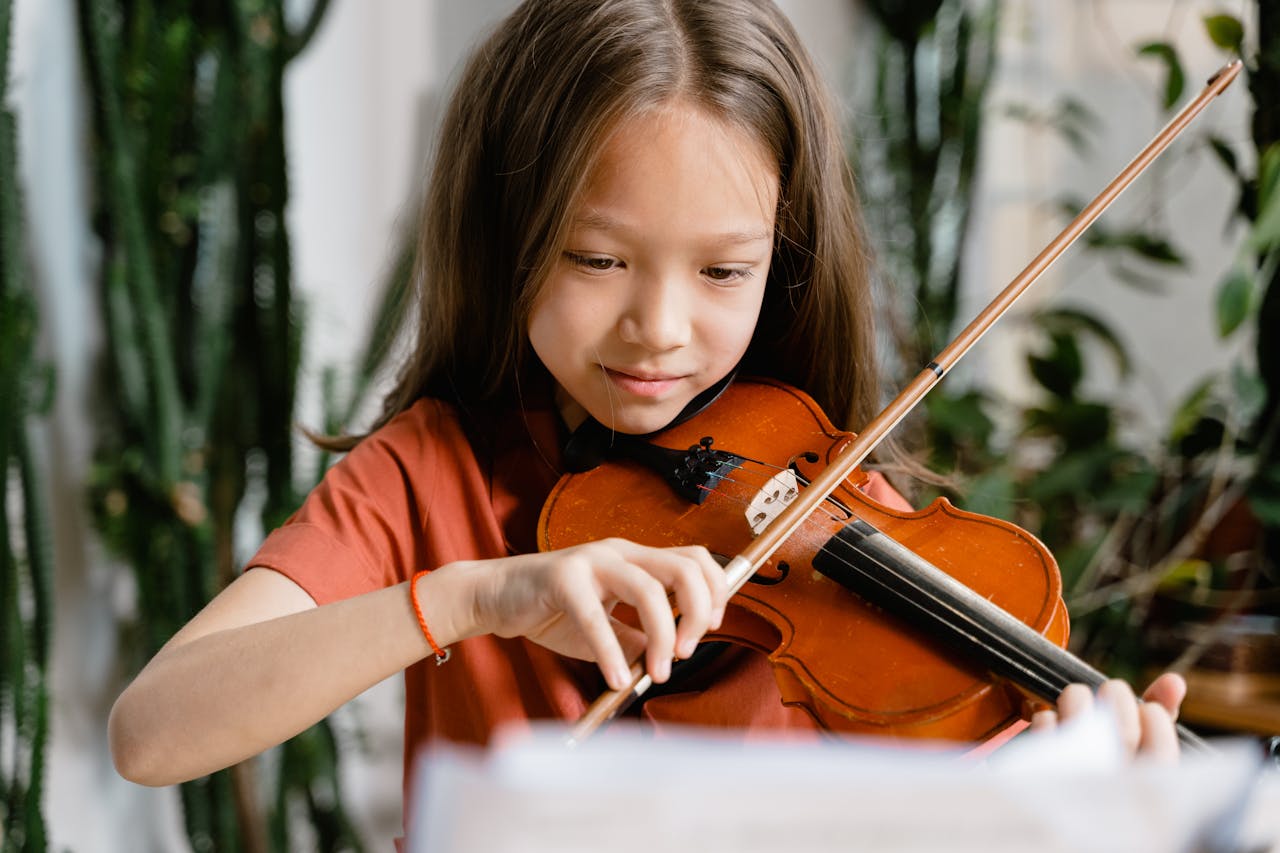 A Girl Playing the Violin.